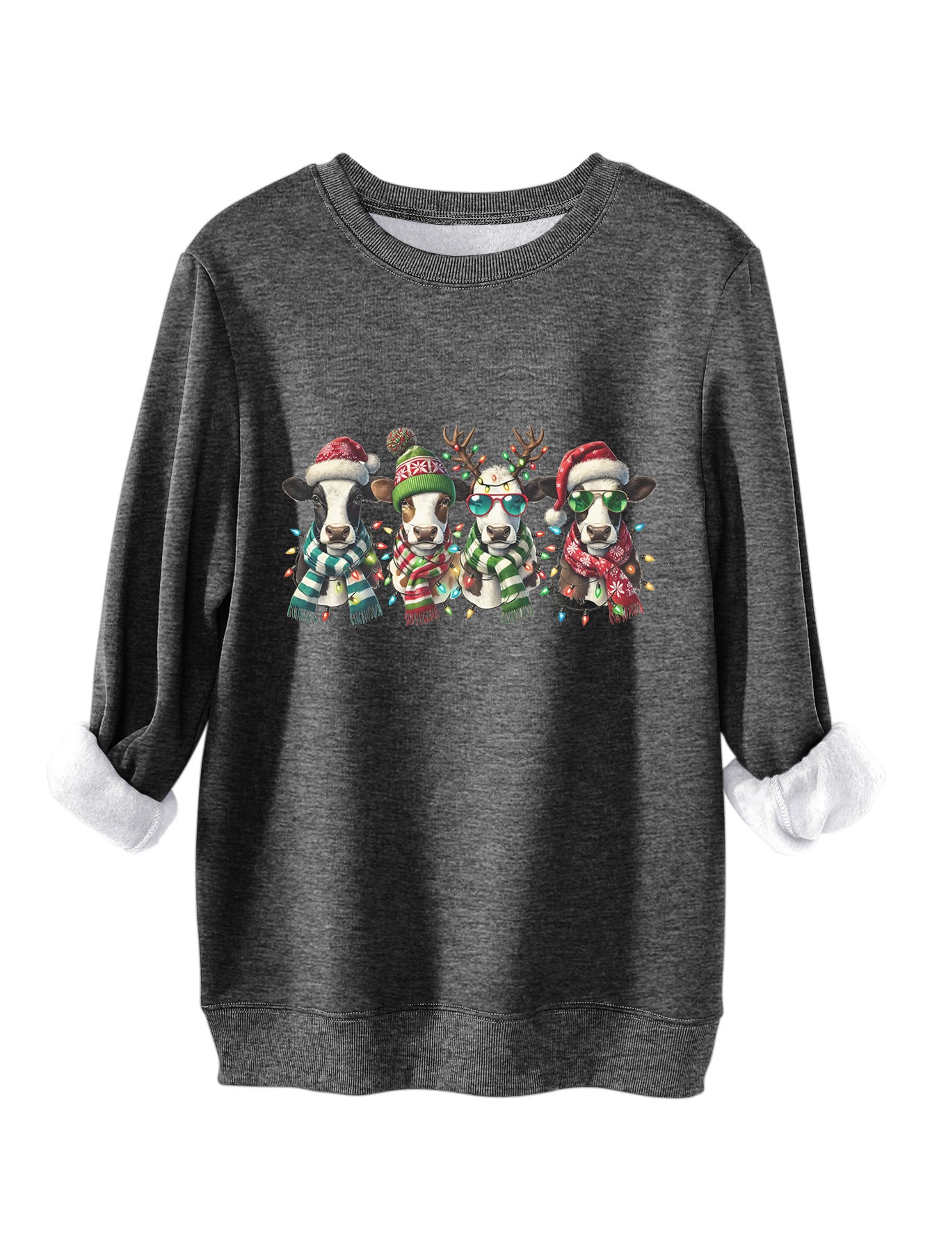 Four cows wearing hats scarves thick hoodies